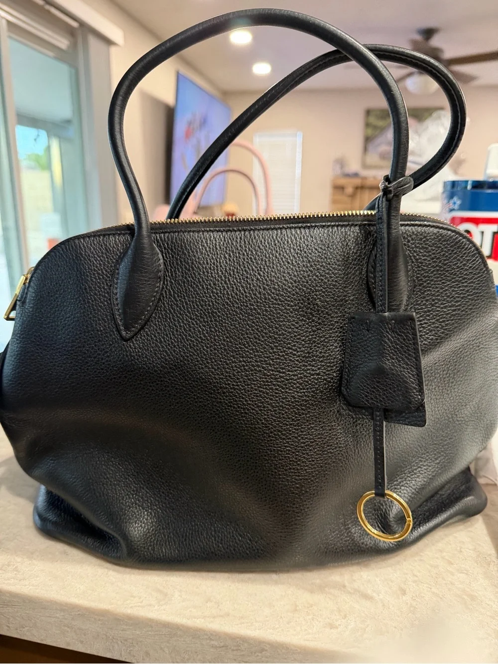 Prada Black Pebbled Leather Satchel with Gold Logo